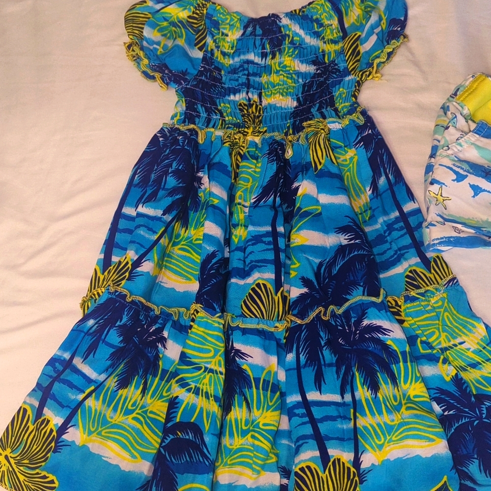Hawaiian dress from Maui never worn purchased as a gift- shorts are free